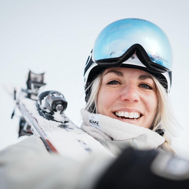 Kaveri Mehta, Lead Design Curator at SaffronDriftNovel, reviewing corporate floral arrangements